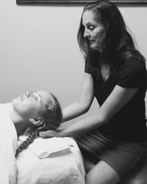 Photo of Charlene Way Performing Massage Therapy